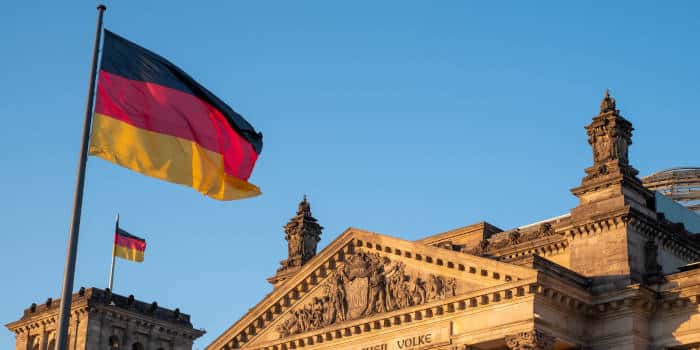 The German parliament and national flag.