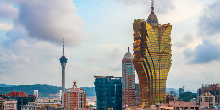 The Macau skyline with casino buildings visible.