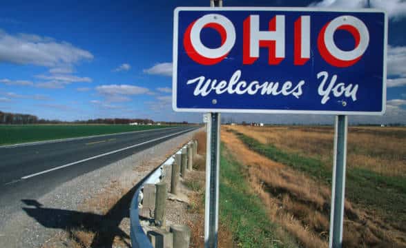 Road sign with text Ohio welcomes you