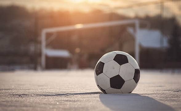 A soccer ball in the snow