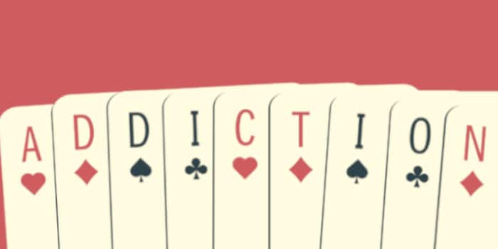 The word addiction written with cards