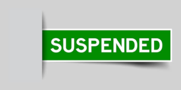 Suspended green color sticker, suspended license