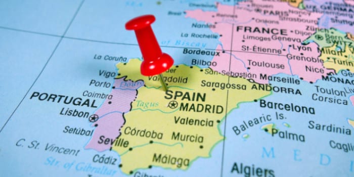 A pin dropped on Spain on the world map