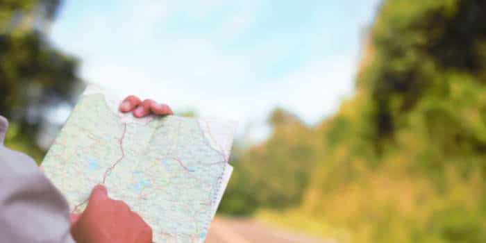 A person looking at a roadmap.