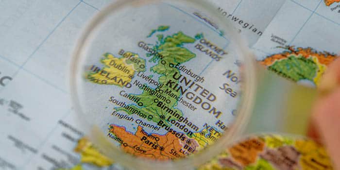 The UK map under a magnifying glass