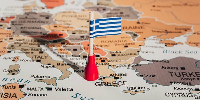 Greece flagged on the map of Europe