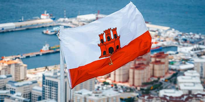 Gibraltar's flag in a coastal urban area