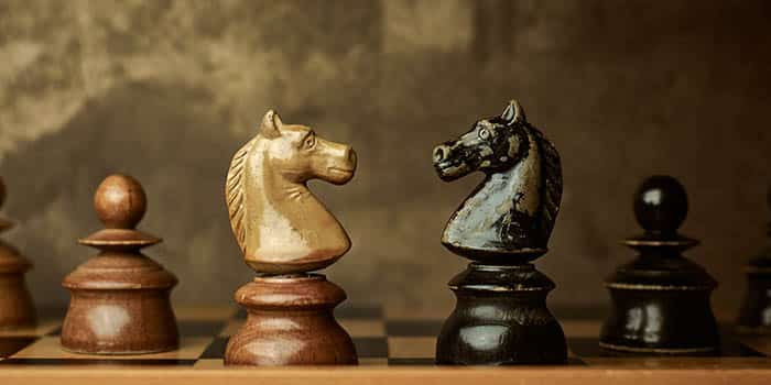 Chess figures representing a conflict