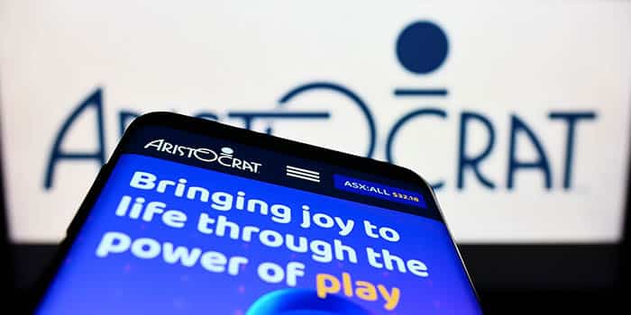 Aristocrat's official logo appears on a mobile device