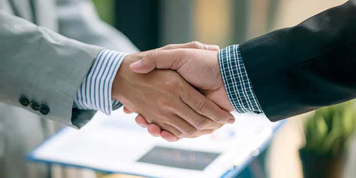 A handshake between two businessmen