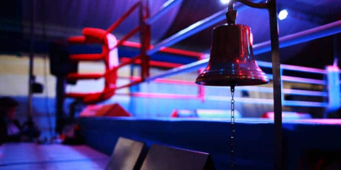 Boxing ring and bell.