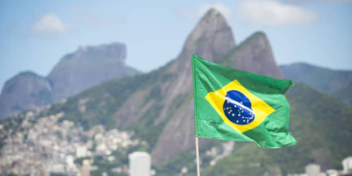 A Brazilian flag waving in the air