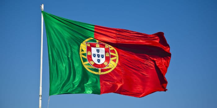 The flag of Portugal on a pole