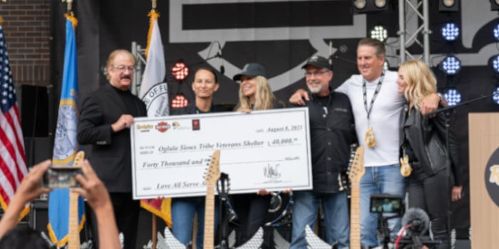 A donation being made at the opening ceremony of Hard Rock Rocksino in Deadwood, South Dakota