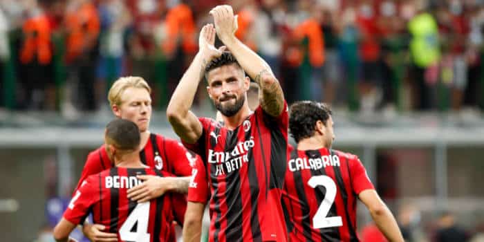 AC Milan's players cheering.