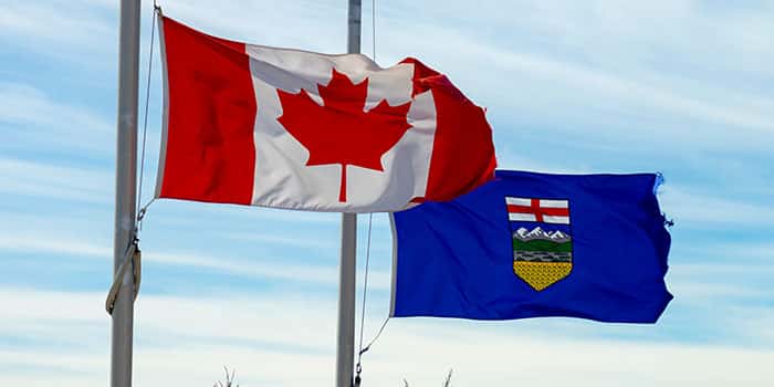 The flags of Canada and its province of Alberta