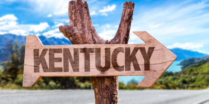 Kentucky wooden road sign pointing to the right