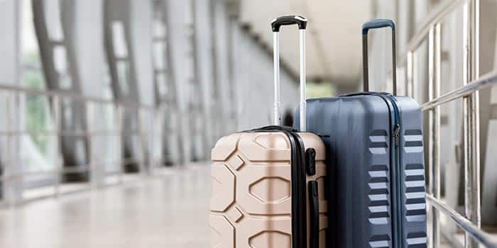 Two suitcases at an airport