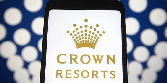 Crown Resorts' logo appears on a mobile device