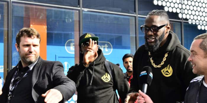 Deontay Wilder walking with his team towards the facility where he will fight.