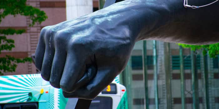 Detailed shot of the "The Fist" Joe Louis monument in Hart Plaza on Jefferson Avenue. This historic monument is a key attraction to downtown Detroit in the summer