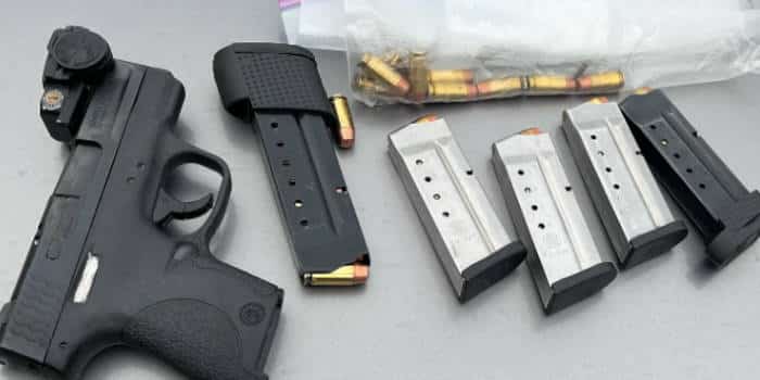 A handgun, ammunition and drugs