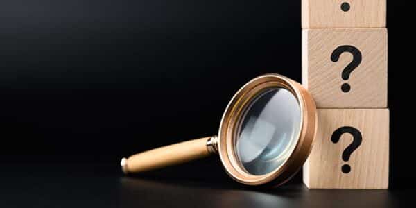 magnifying-glass-business-questions-news