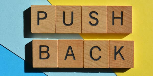 pushback-concept-wooden-blocks-news