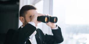 business-man-spies-spy-binoculars-news