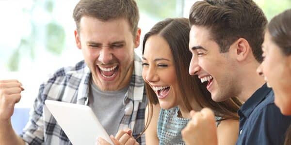 group-of-happy-young-people-lottery-win-news
