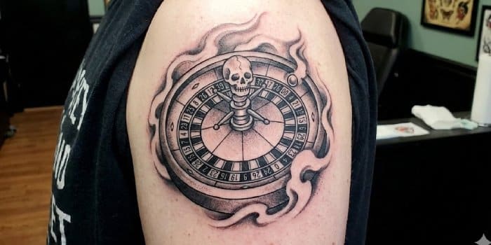 roulette wheel of fate gambling tattoo