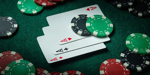 casino-chips-aces-poker-green-felt-table-game-news