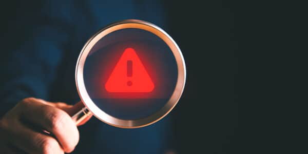 warning-attention-exclamation-point-magnifying-glass-news