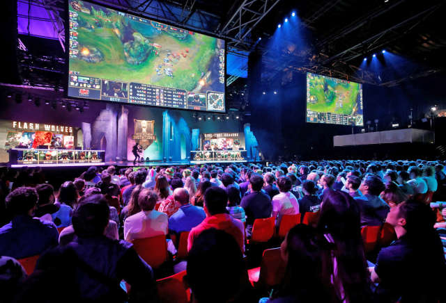Esports live audience watching a game of Dota 2.